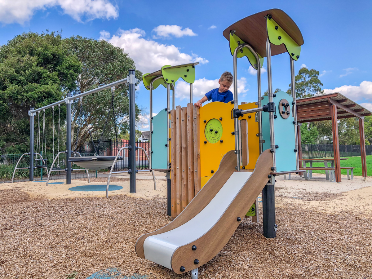 Boy on play structure