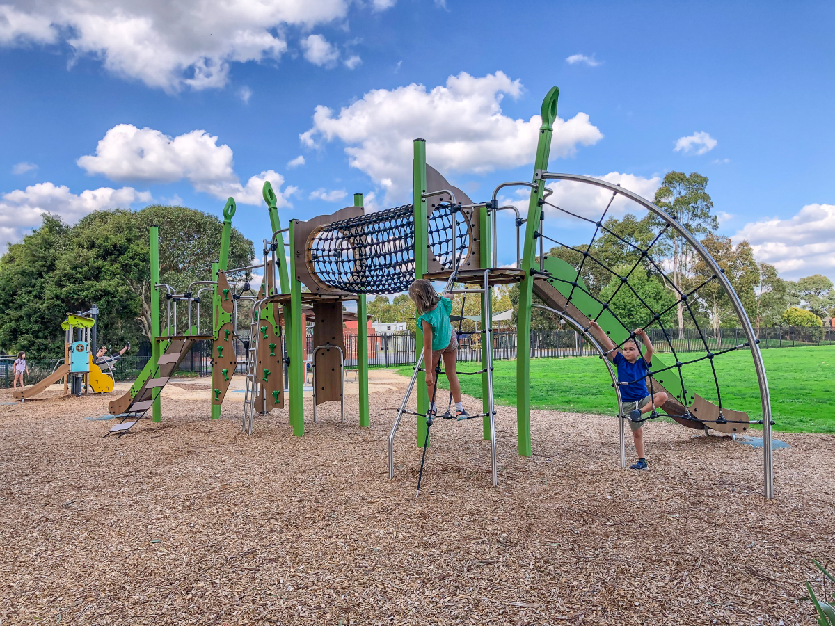 Children climbing on play structure at Karoo Reserve Playground