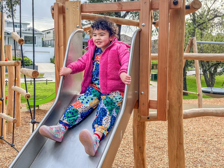 Child playing on a slide