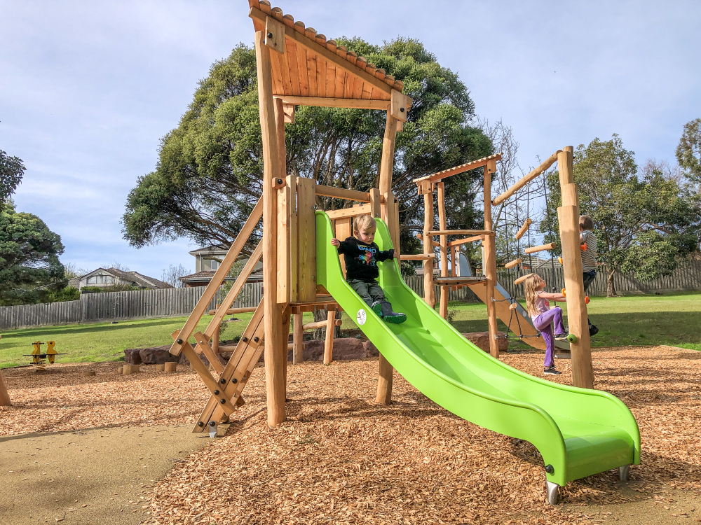 Child playing on slide